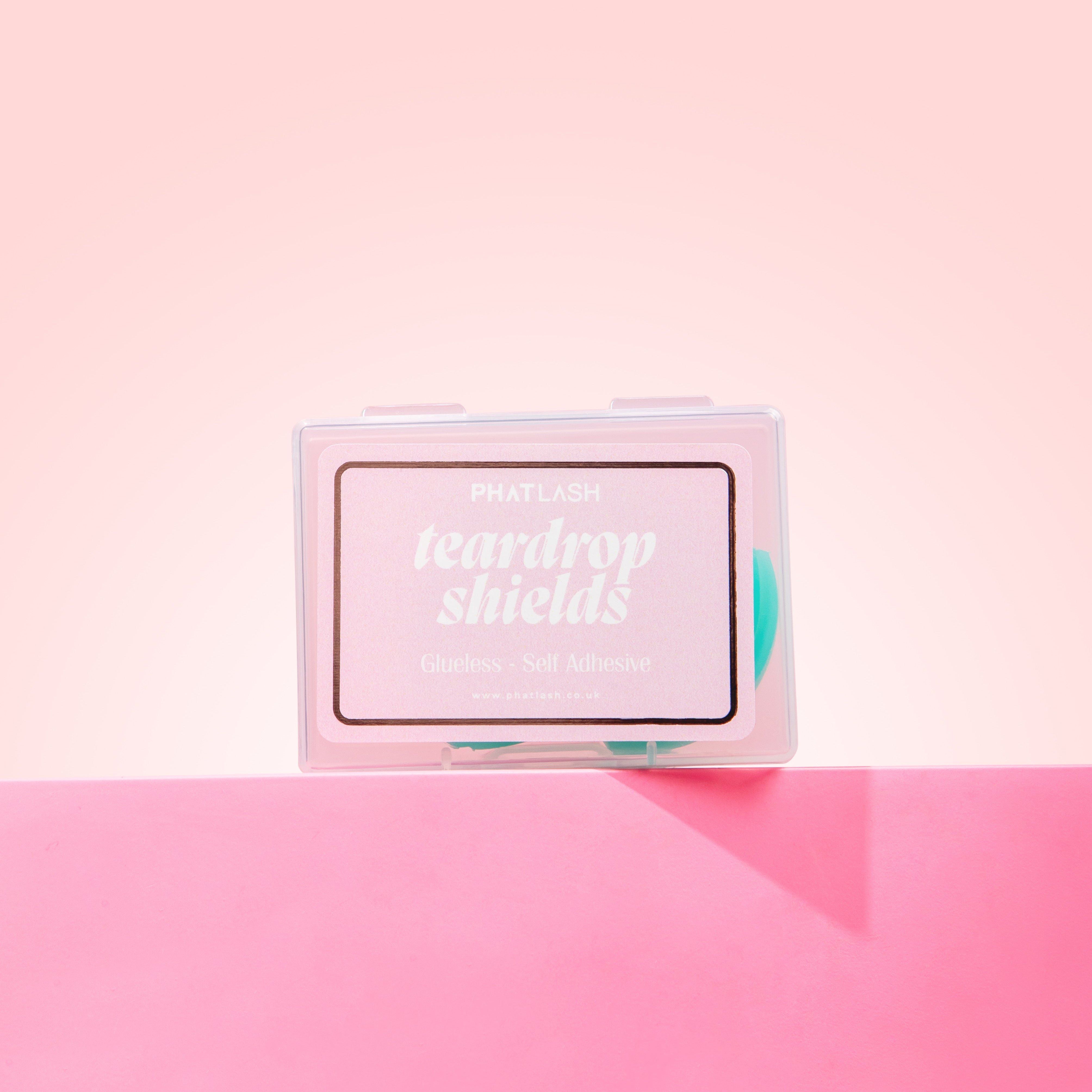 Product packaging with 'teardrop shields' on a pink background